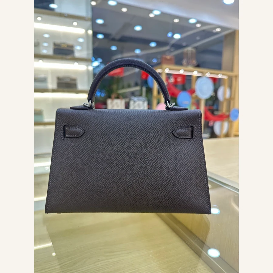 Hermes Mini Kelly black bag back catalog photo